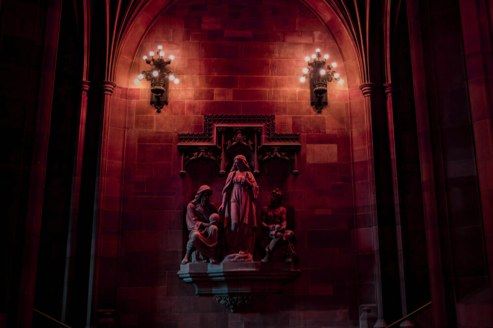 Holy stone figures carved into a Gothic stone cathedral